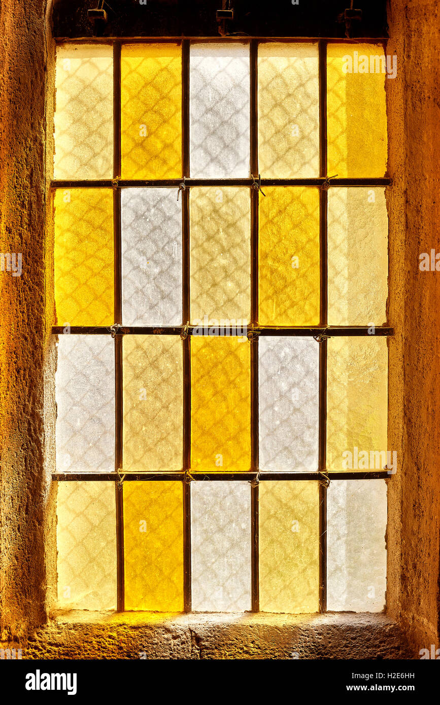 Photo of an old stained glass window. Stock Photo