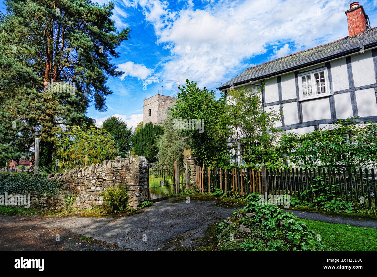 A tea room and old halftimbered black and white cottage beside the