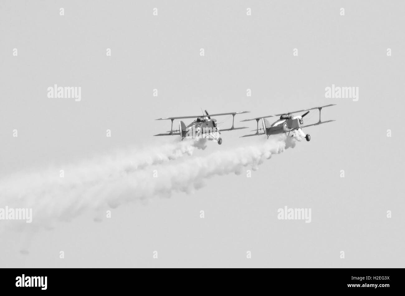 bi-plane in flight during an air show Stock Photo