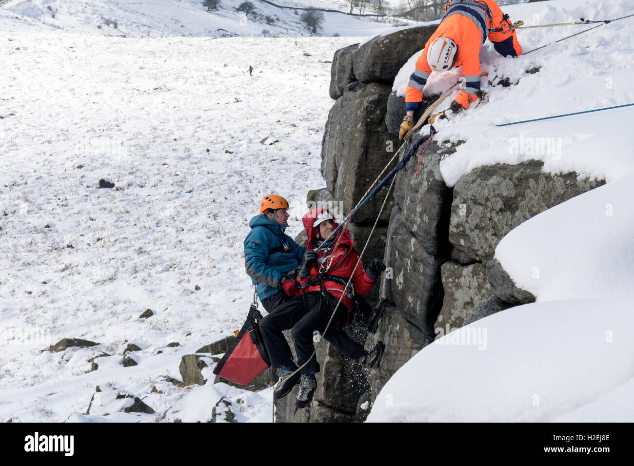 Mountain Rescue team training  in the snow covered Peak District Derbyshire 2016 Stock Photo