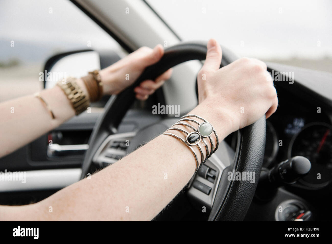Female hands on steering wheel hi-res stock photography and images - Alamy