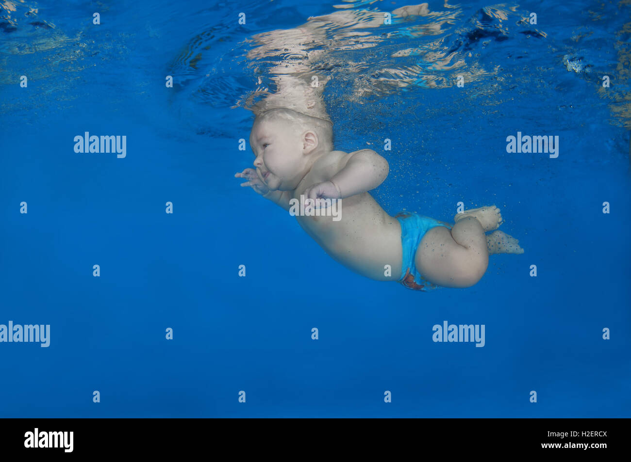 Odessa, Ukraine. 6th Sep, 2016. 6 months infant boy learning to swim