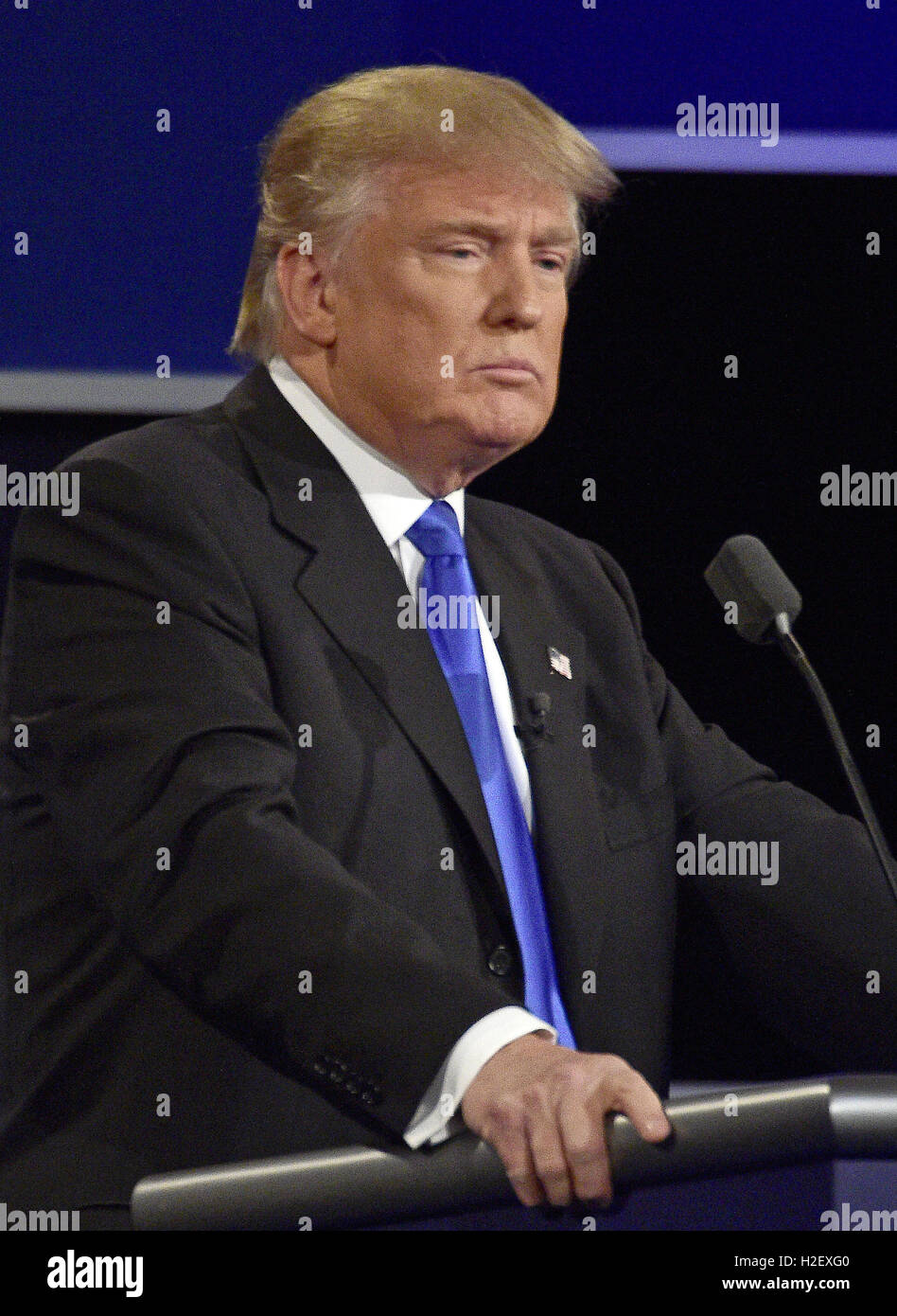 Hempstead, New York, USA. 26th Sep, 2016. Businessman Donald J. Trump, the Republican Party nominee for President of the United States, makes a point as he appears with former US Secretary of State Hillary Clinton, the Democratic Party nominee for President of the US in the first of three presidential general election debates at Hofstra University in Hempstead, New York on Monday, September 26, 2016.Credit: Ron Sachs/CNP. Credit:  Ron Sachs/CNP/ZUMA Wire/Alamy Live News Stock Photo