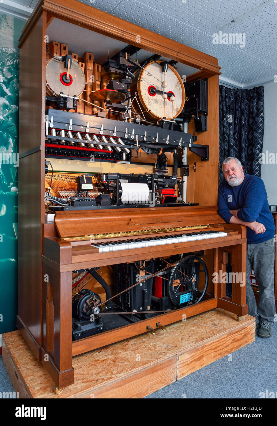 Thomas Jansen presenting a self-playing musical instrument of the type 'Hupfeld-Sinfonie-Jazz-Orchester' from 1920 in his Music Museum in Beeskow, Germany, 24 October 2016. PHOTO: PATRICK PLEUL/dpa Stock Photo