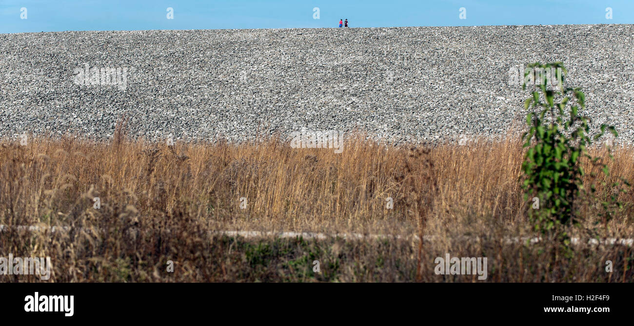 St. Charles, Missouri, USA. 28th Oct, 2016. The Weldon Spring Site Remedial Action Project Disposal Cell is a 41-acre site for the storage of radioactive waste. During WW II, the U.S. Army manufactured TNT here, and the U.S. Atomic Energy Commission produced uranium for nuclear weapons between 1957 and 1966. In 2001, the Department of Energy completed remediation of the Weldon site, which now holds, under tons of limestone, 1.48 million cubic yards of radioactive and chemical waste, including PCB's, mercury, asbestos, TNT, radioactive uranium and radium. The Weldon Spring Site is now a t Stock Photo