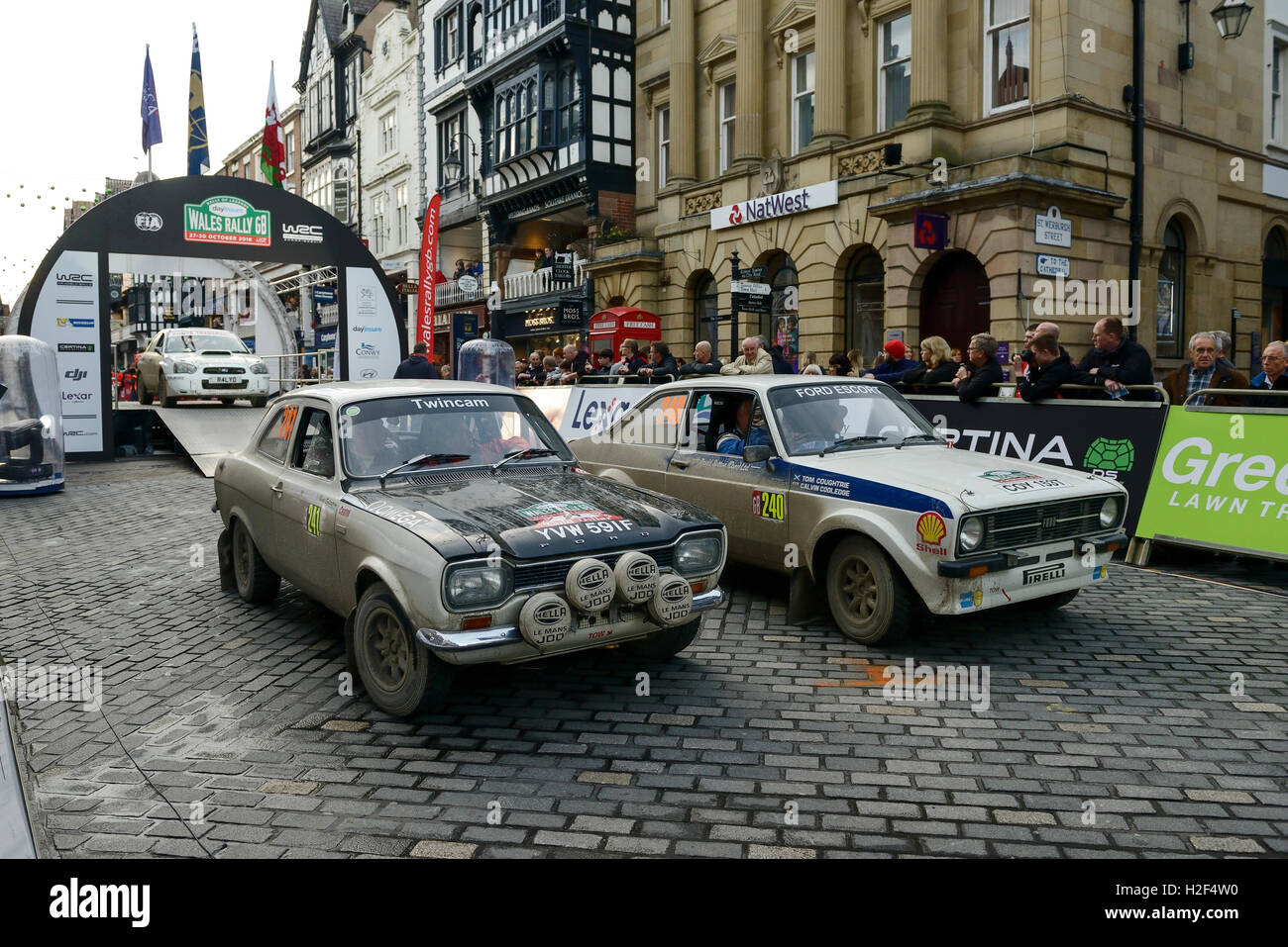 Chester, UK. 28th October, 2016. Wales Rally GB. At the end of day one, Ford Escort cars competing in the WRGB National Rally drive through Chester City centre. Credit: Andrew Paterson/Alamy Live News Stock Photo
