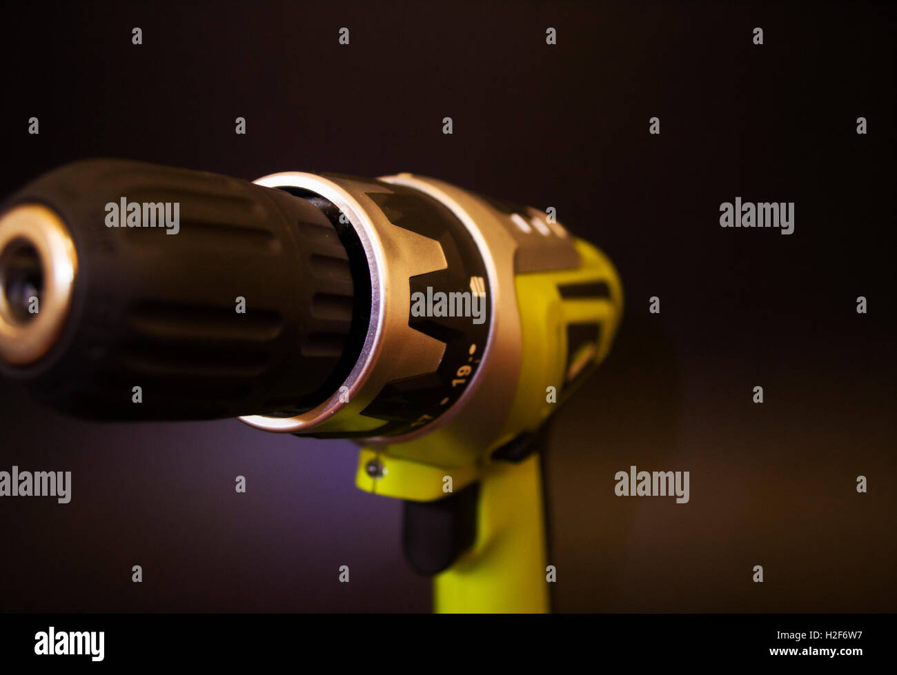 green drill tool image with white background. Battery operated power