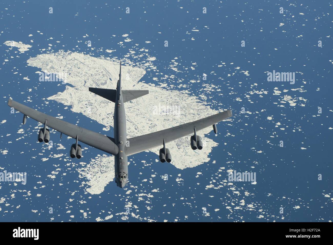 A U.S. Air Force B-52 Stratofortress bomber aircraft flies during Polar Roar exercises July 31, 2016 near the North Pole. Stock Photo