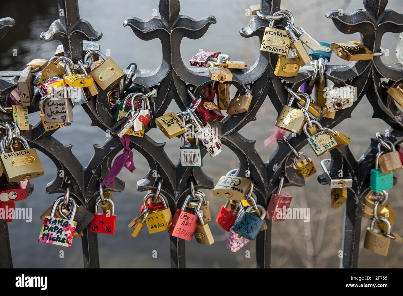 Love locks on railings next to Charles Bridge Prague Stock Photo