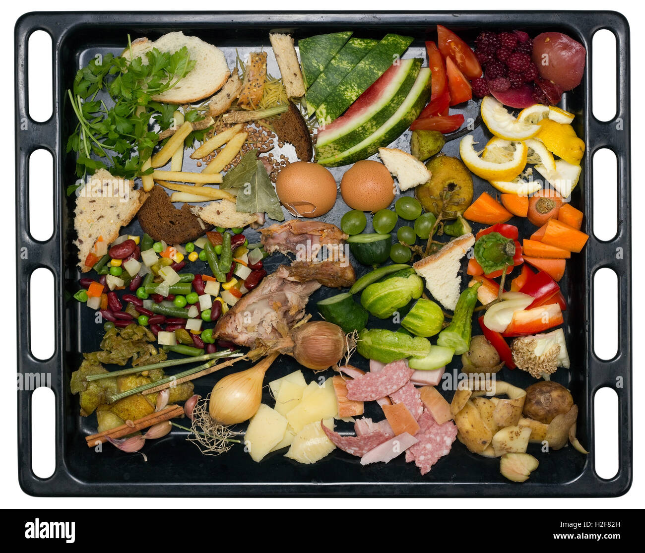 Kitchen food wastes on the black enameled pallet concept. Isolated with patch top view studio shot Stock Photo