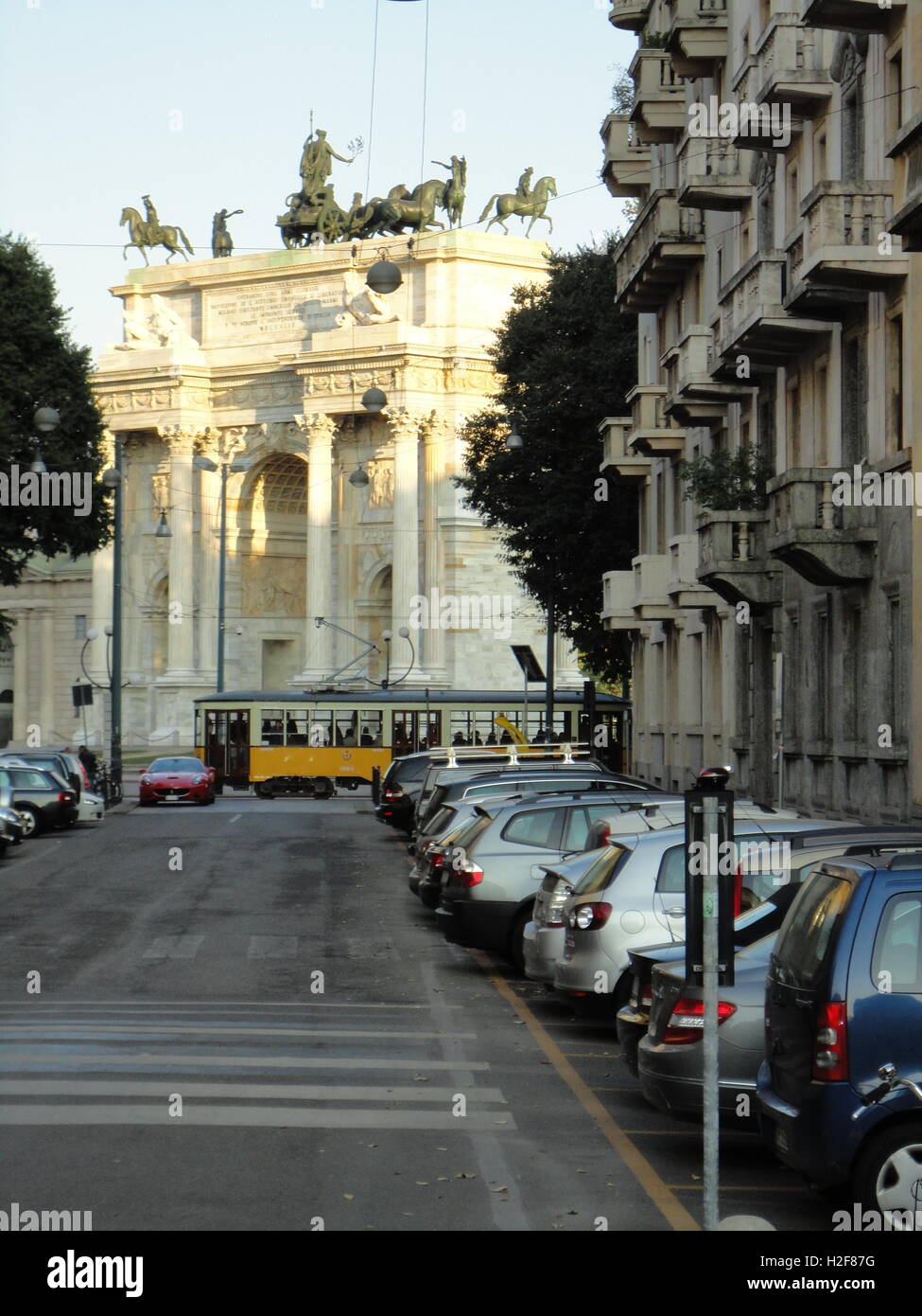 the Arco della Pace, from a distant street, Milan, Italy Stock Photo