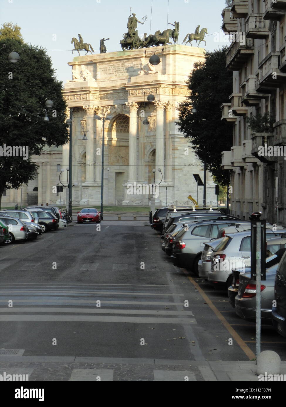 the Arco della Pace, from a distant street, Milan, Italy Stock Photo