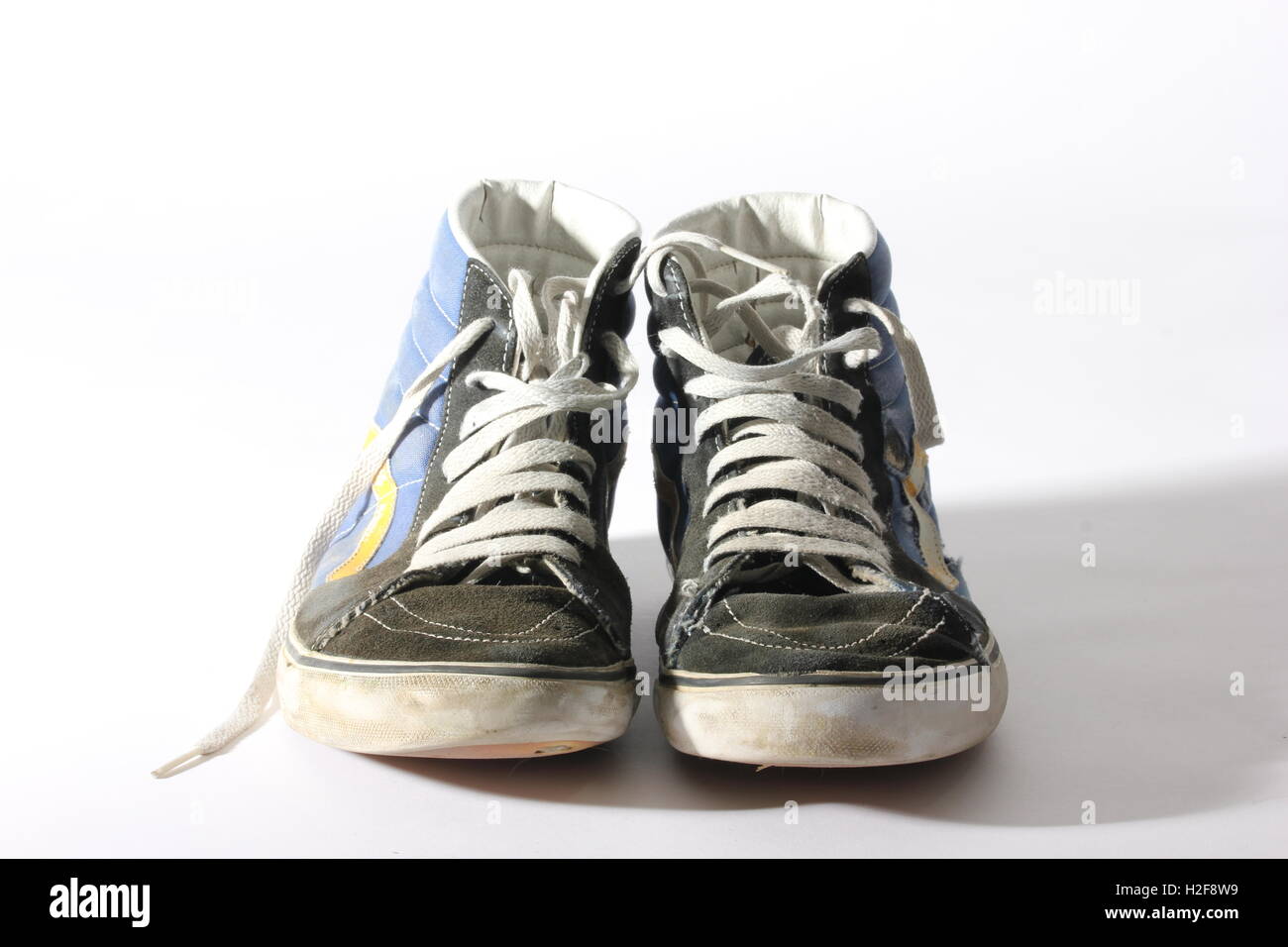 warn out vans hi-top skateboard shoes on white background, used, distressed  Stock Photo - Alamy