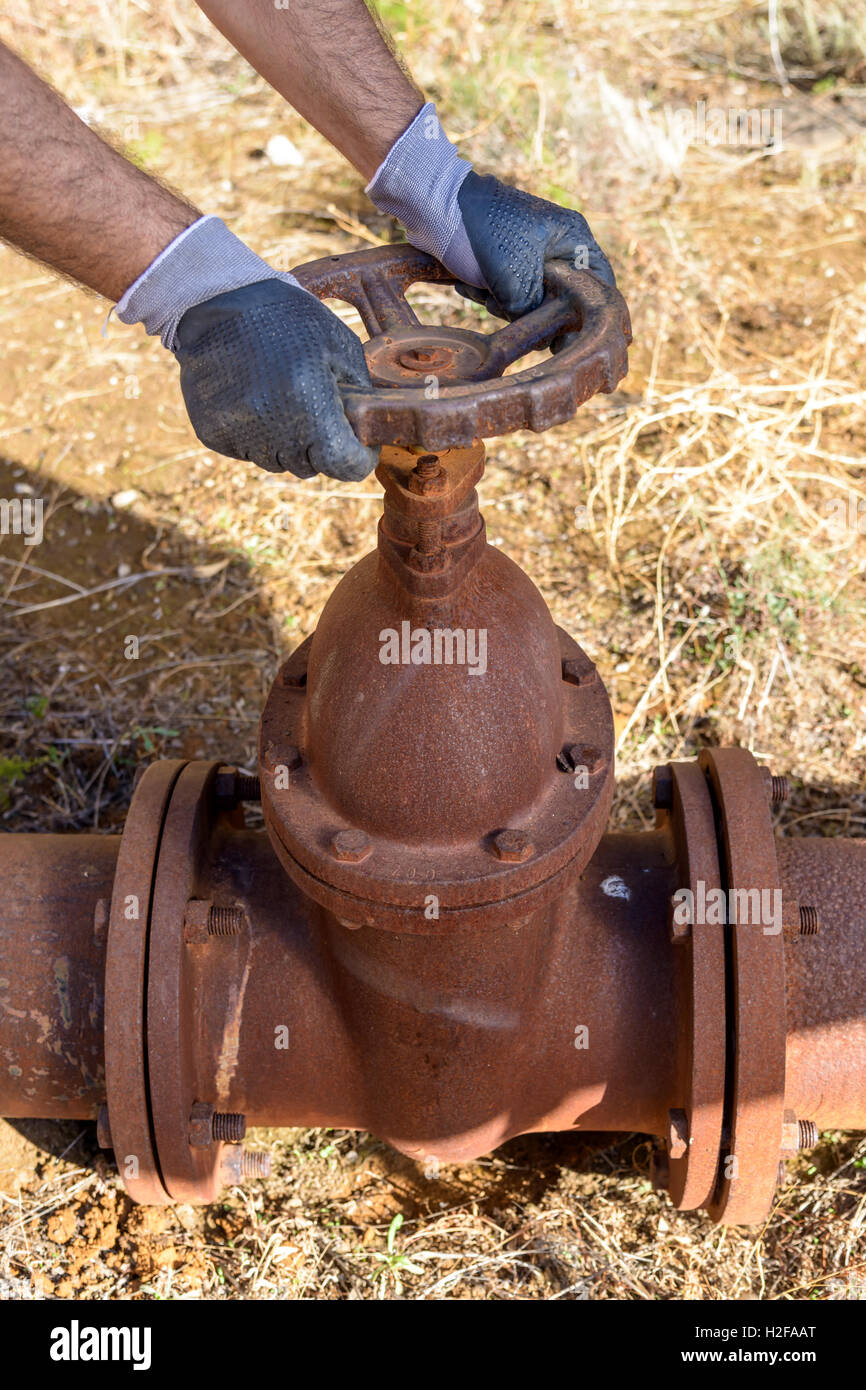 Hands of a workman tighten a bolt Stock Photo Alamy