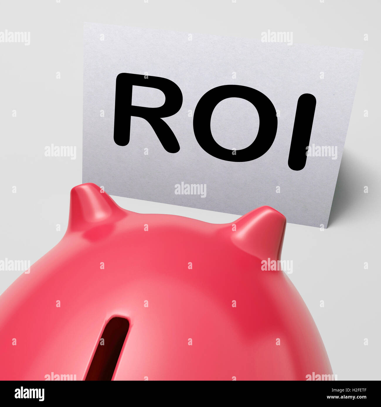 ROI Piggy Bank Means Investing Financing And Return Stock Photo Alamy