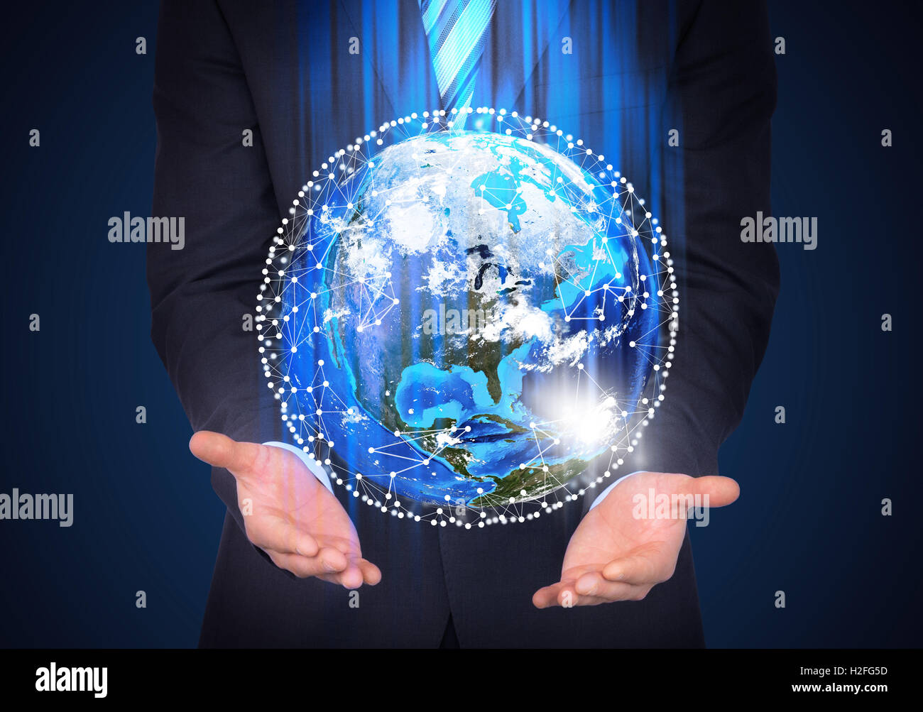 Businessman hand holding globe icon hi-res stock photography and images ...