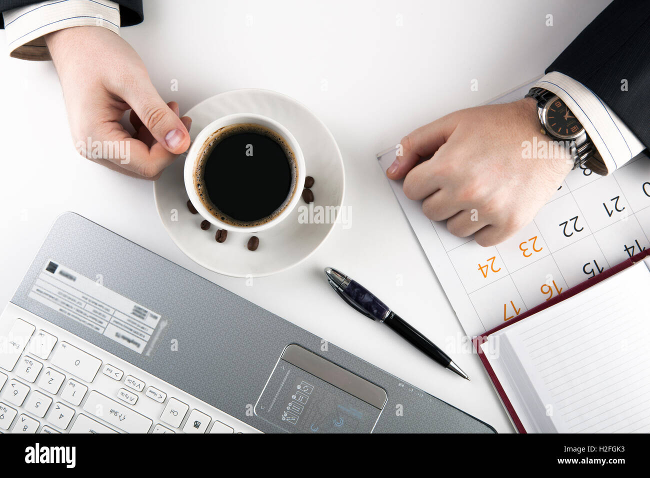 man and cup of coffee in the workplace Stock Photo - Alamy