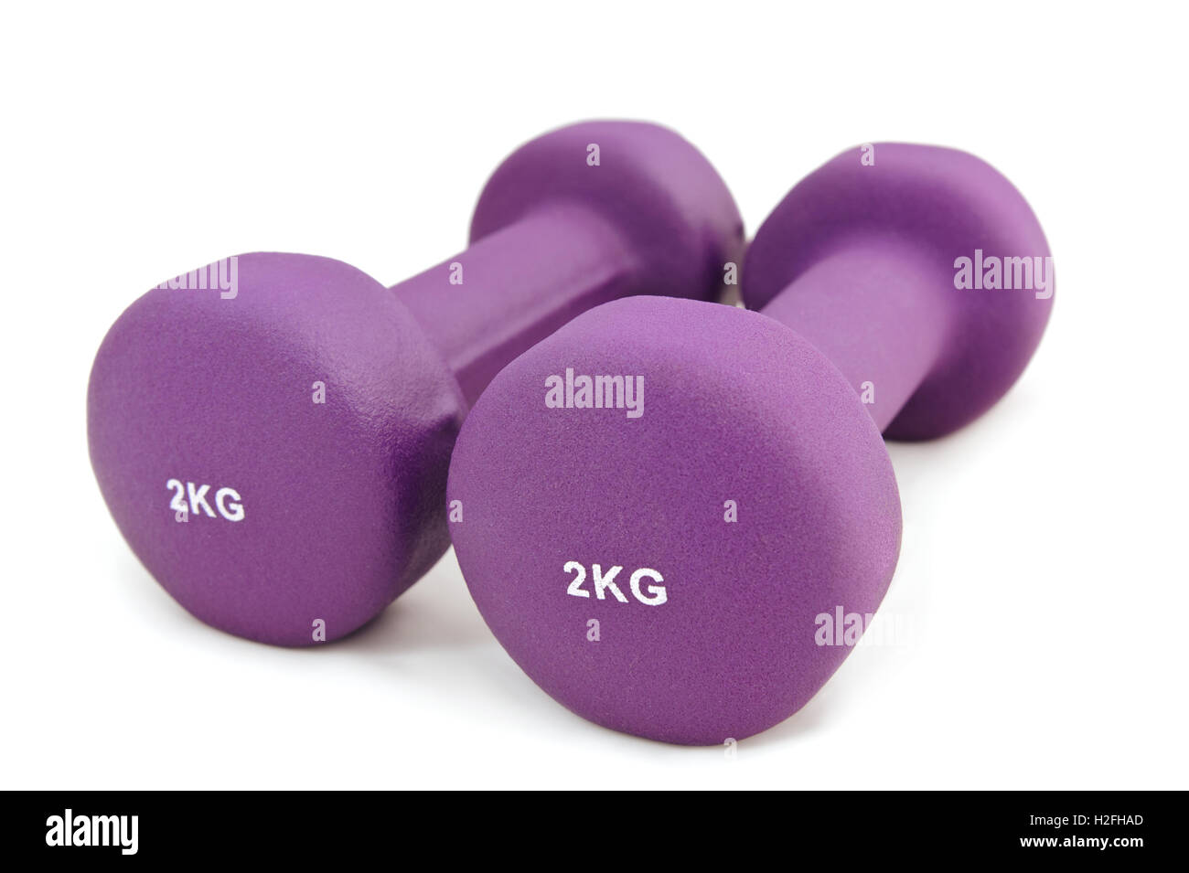 2 kg rubber dipped purple dumbbell Stock Photo