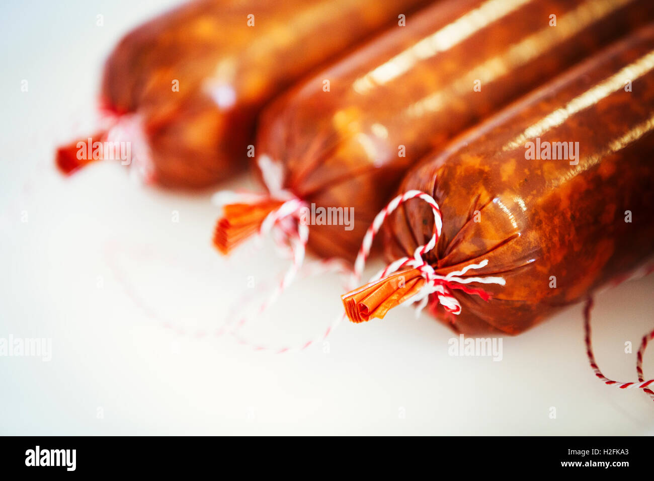 Close up of three Chorizo sausages. Stock Photo