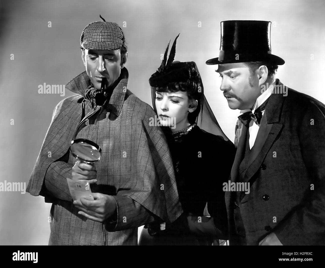 THE ADVENTURES OF SHERLOCK HOLMES 1939 Twentieth Century Fox film with from left Basil Rathbone, Ida Lupino, Nigel Bruce Stock Photo