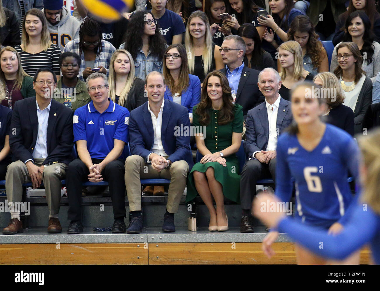 The Duke and Duchess of Cambridge watch a volleyball game at the University of British Columbias campus in Kelowna, Canada, on the fourth day of the royal tour to Canada Stock Photo -