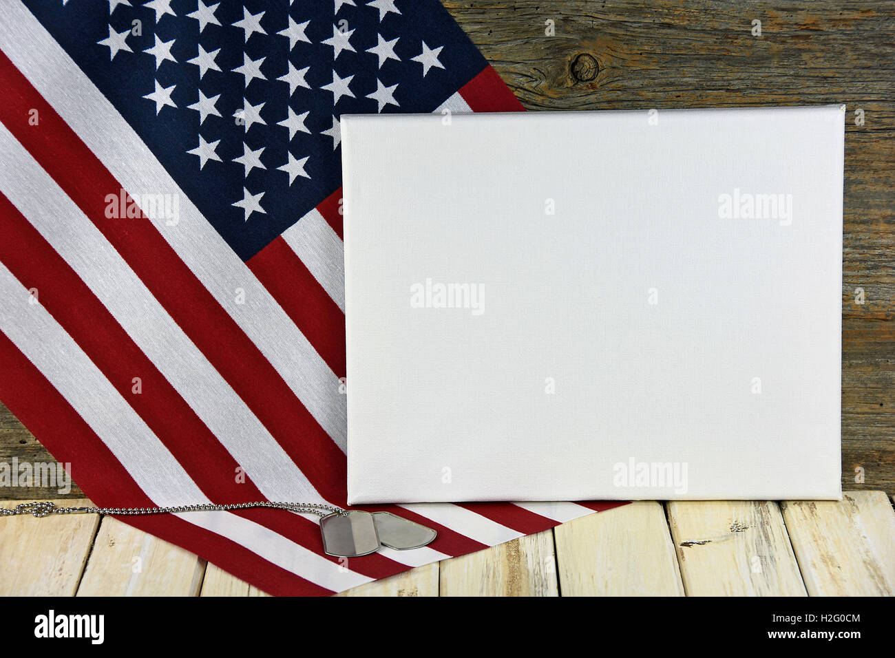 military dog tags and white blank canvas on American flag Stock Photo ...