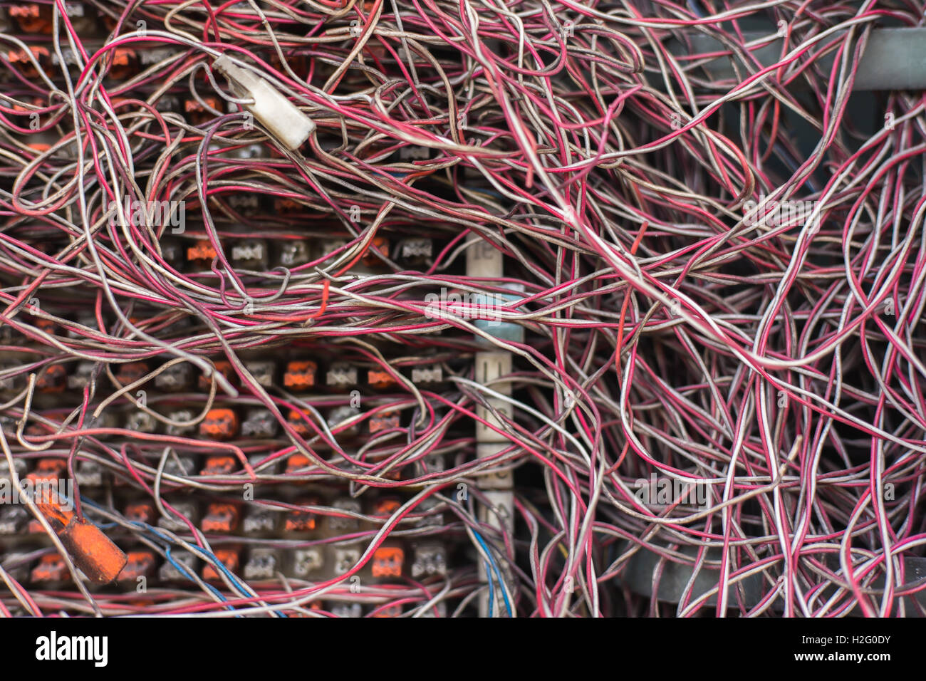 Switchboard panel with messy cables connections,The PABX. Stock Photo