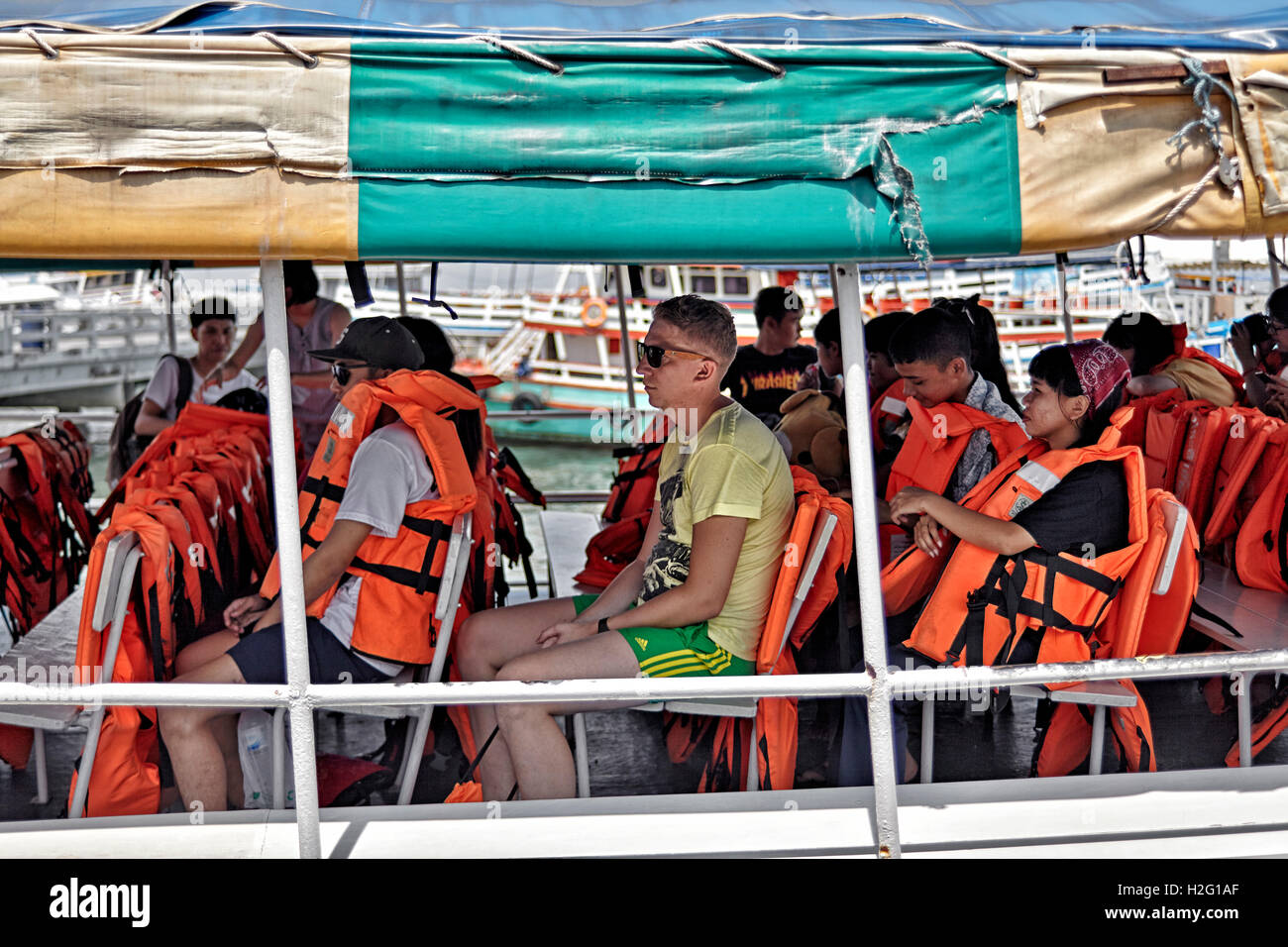 People wearing life jackets hi-res stock photography and images - Alamy