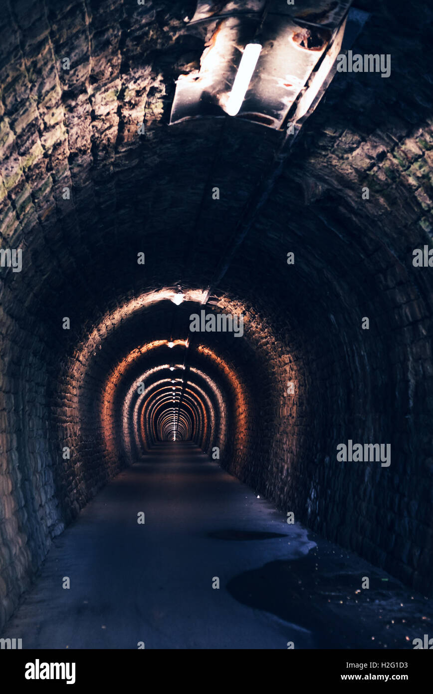 Endless tunnel as abstract background with vanishing point perspective Stock Photo