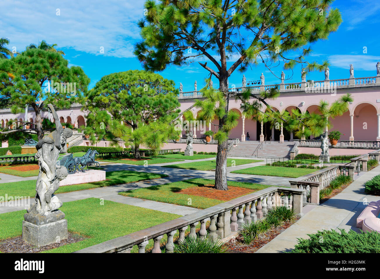 David statue overlooks Opulent Venetian Style gardens and statues atop the Pink portico at Ringling Museum of Art Sarasota FL Stock Photo