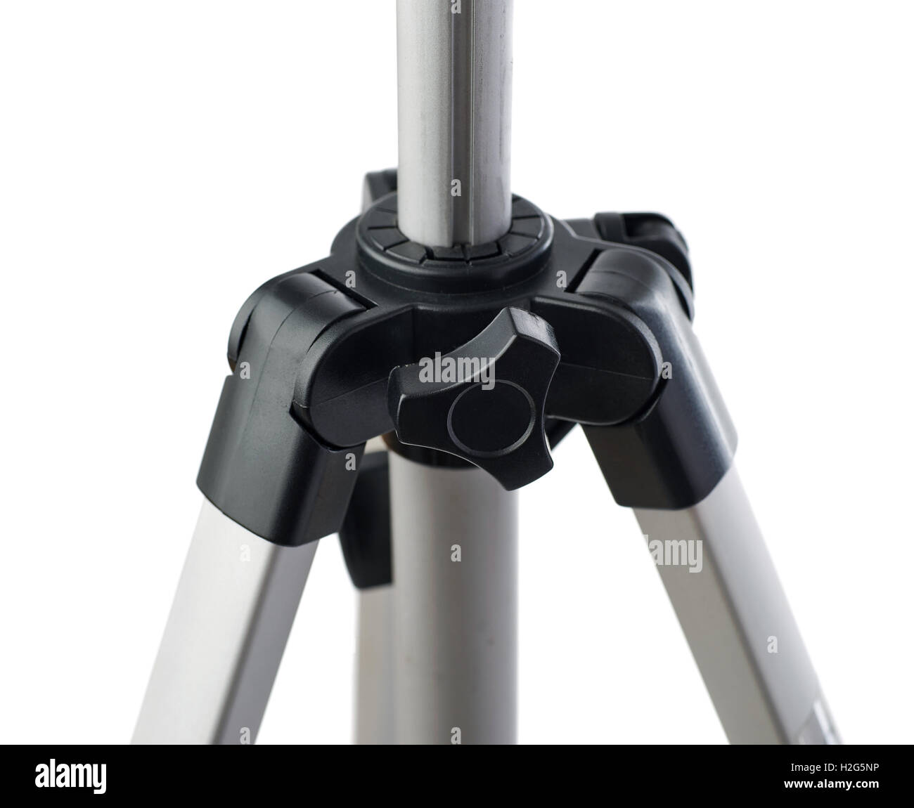 Camera tripod over isolated white background Stock Photo - Alamy
