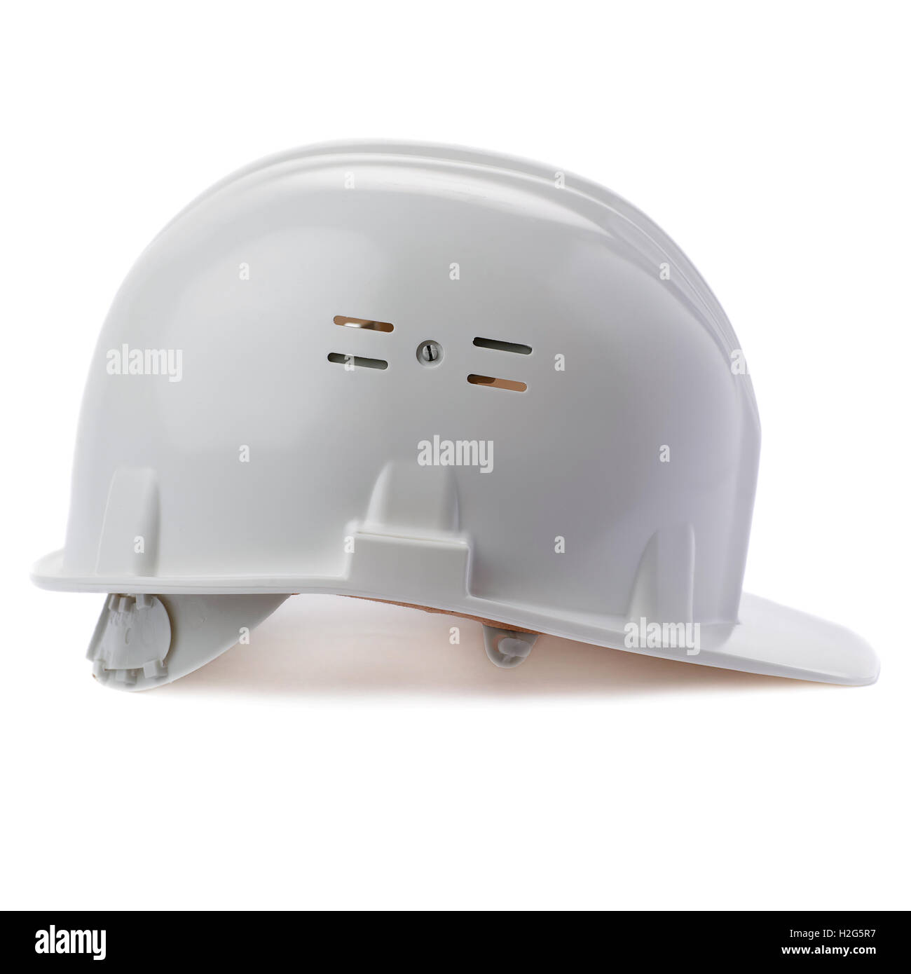 Plastic safety helmet over isolated white background Stock Photo