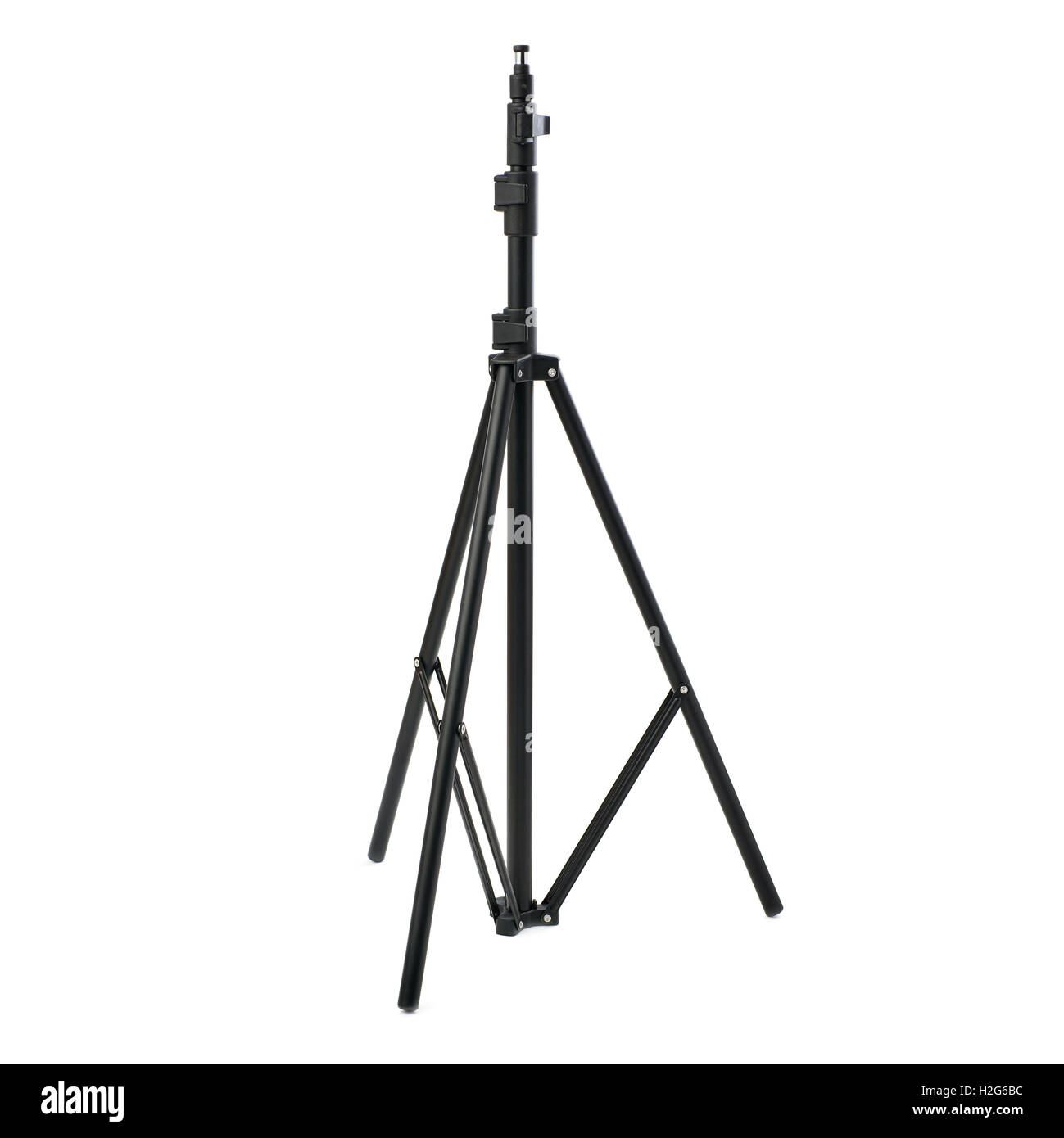 Large Flash Stand Studio flash stand over isolated white background Stock Photo - Alamy