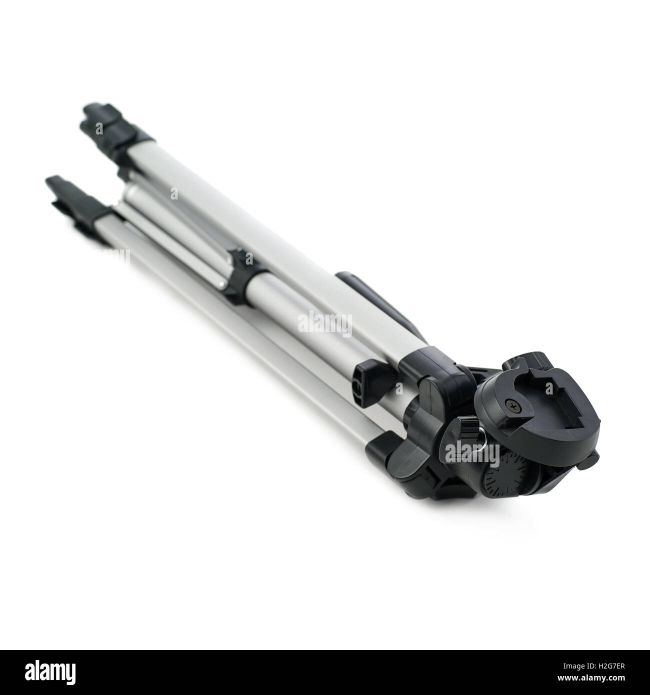 Camera tripod over isolated white background Stock Photo - Alamy