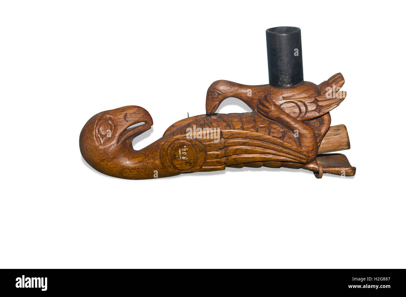 Tlingit pipe from Pacific NW of USA / pipes for smoking tobacco were introduced by early european traders and sometimes depicted Stock Photo