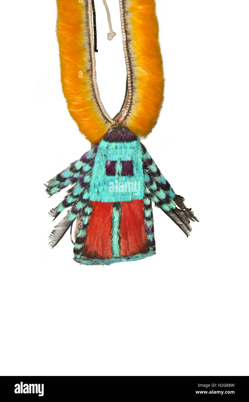 Necklace of yellow toucan feathers, turquoise tanager, purple cotinga and red macaw feathers worn by the Amazonian Urubú–Kaapor Stock Photo