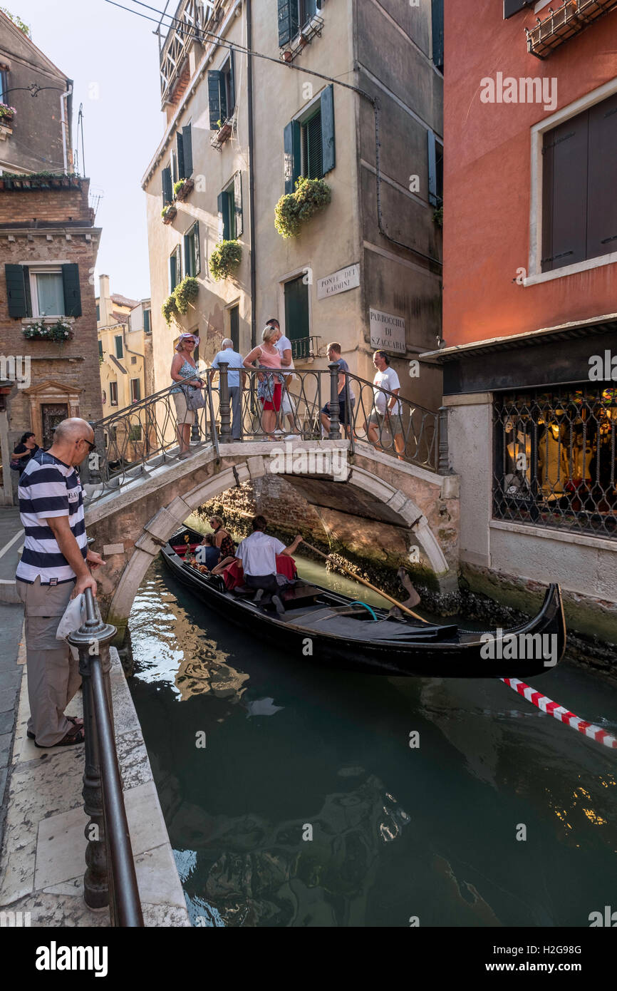 Ponte Dei Carmini in Venice Italy, arched bridge over narrow canal