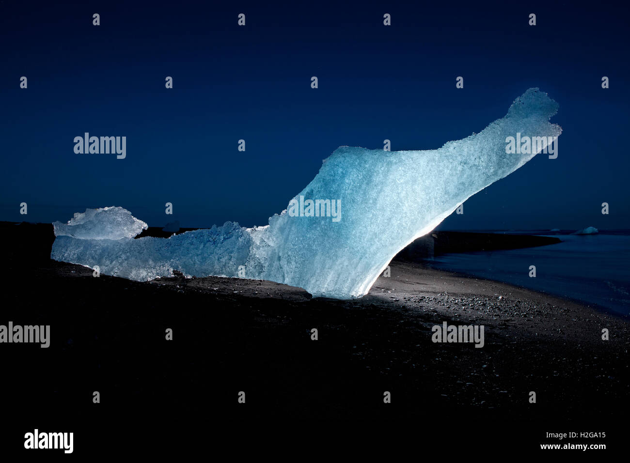 Icebergs of glacial ice on black sands, Breidamerkurfjara beach, Iceland. Located in Eastern Iceland by the Jokulsarlon. Stock Photo