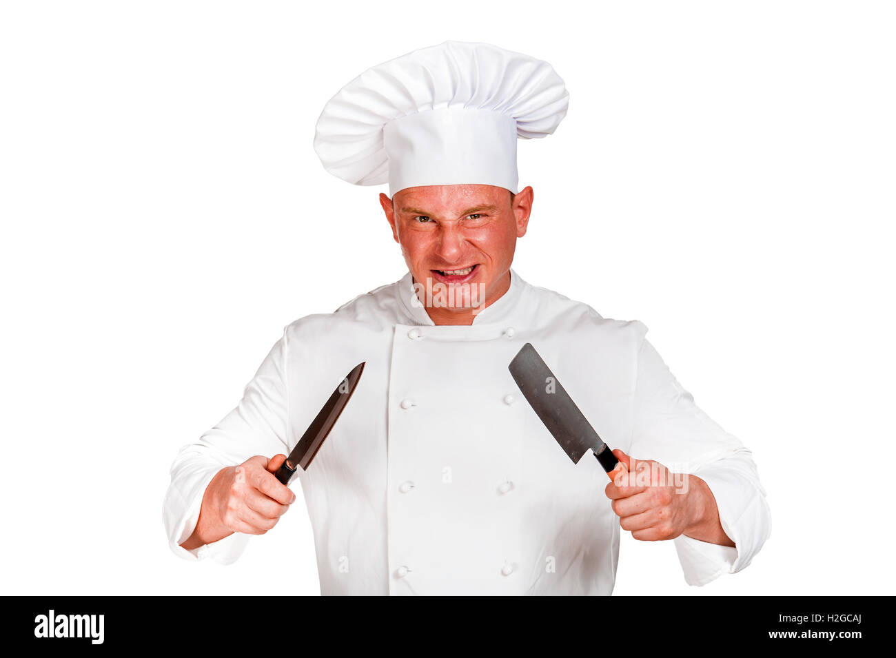 Angry chef with knife isolated over white background. Stock Photo