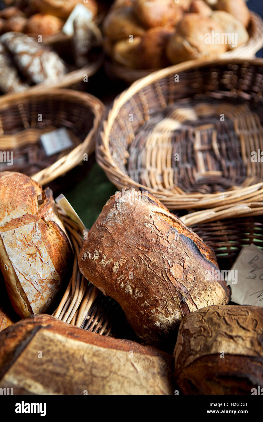 Rustic French bread and baskets in a bakery Stock Photo Alamy