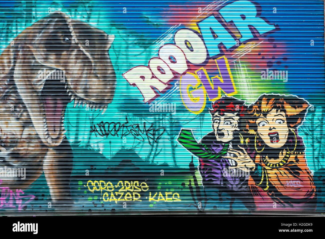 Street art on a metal roller door in Hackney Wick London Stock Photo