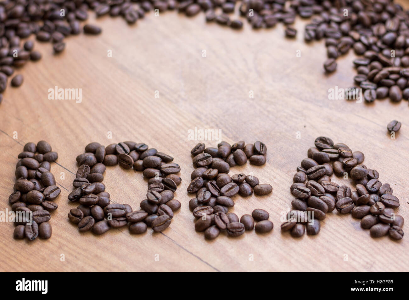 Idea concept sign drawn among brown well roasted coffee beans Stock Photo