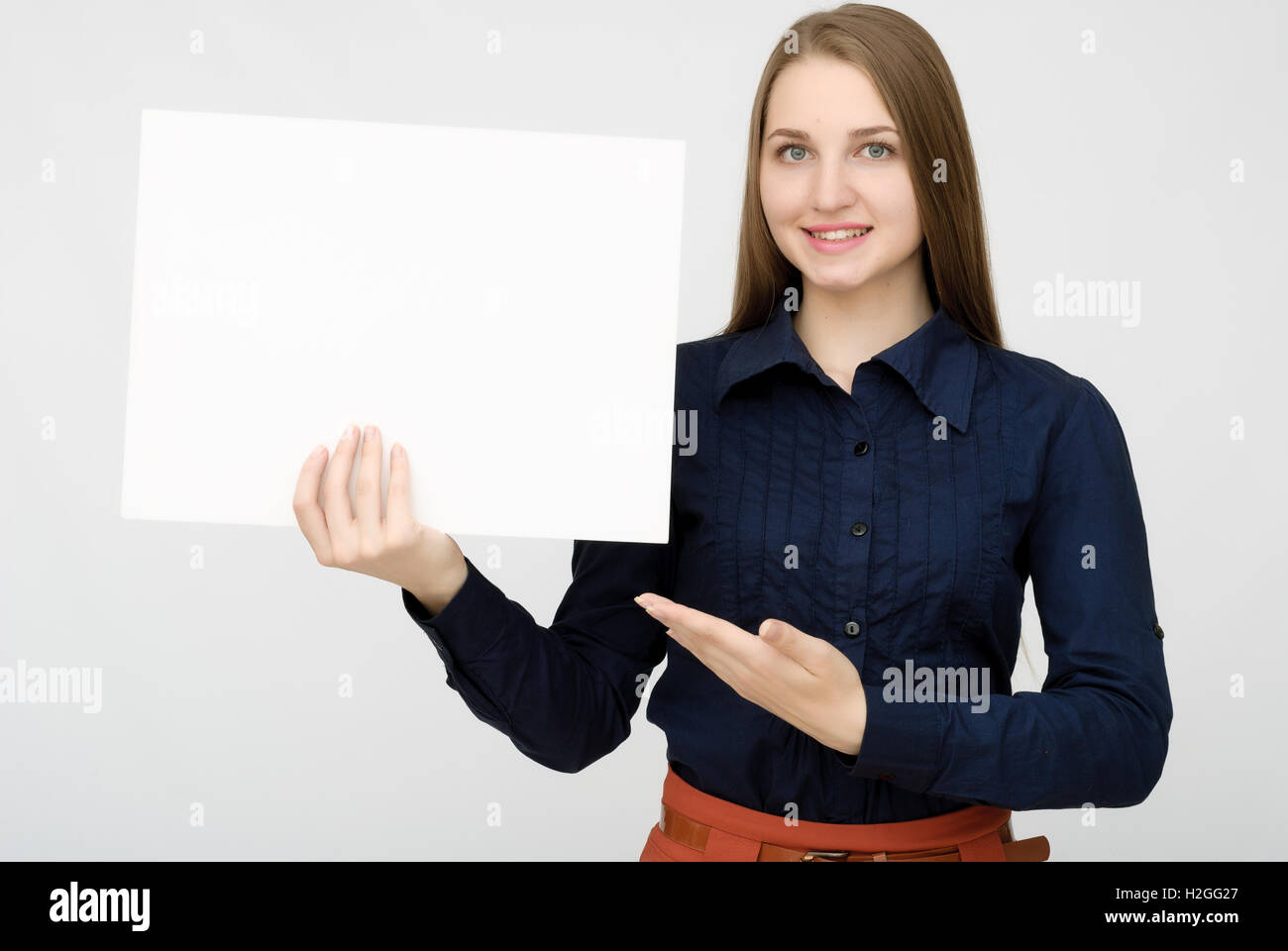 happy woman holding white blank paper Stock Photo - Alamy