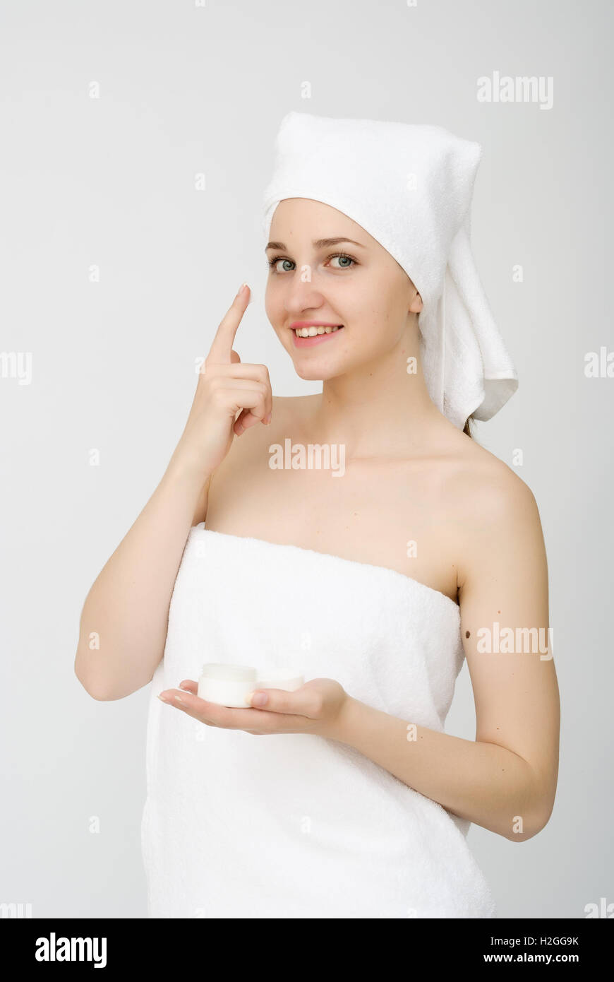 young beautiful woman wrapped in towel Stock Photo - Alamy