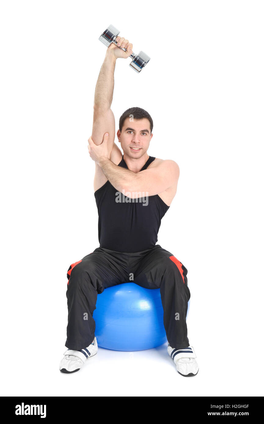 Seated Dumbbell One Arm Triceps Extensions on Fitnes Ball, phase Stock