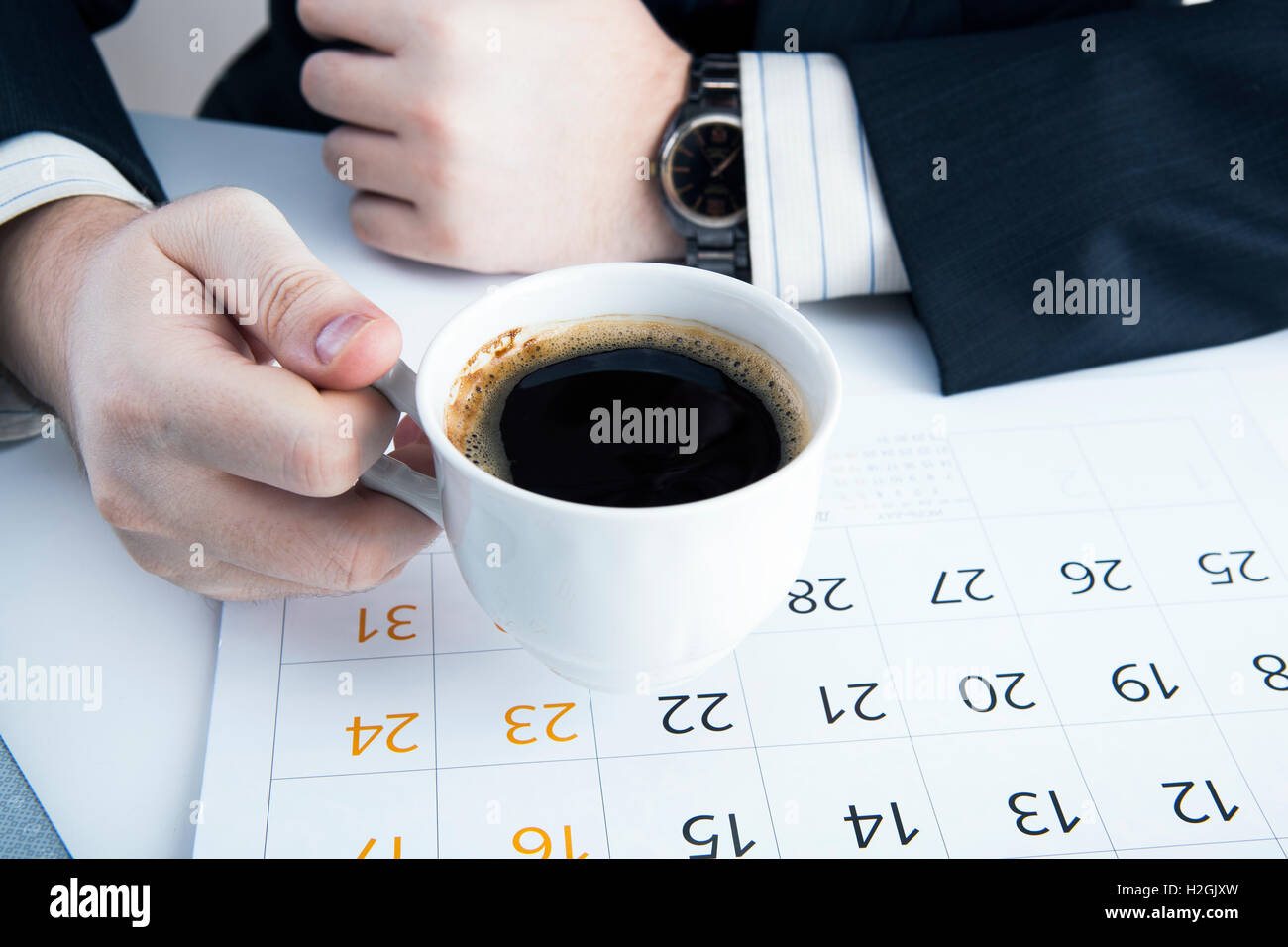 man and cup of coffee in the workplace Stock Photo - Alamy
