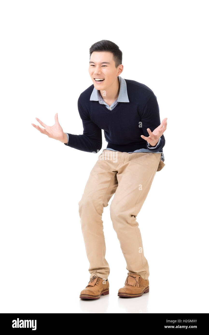 Excited Asian young man Stock Photo - Alamy