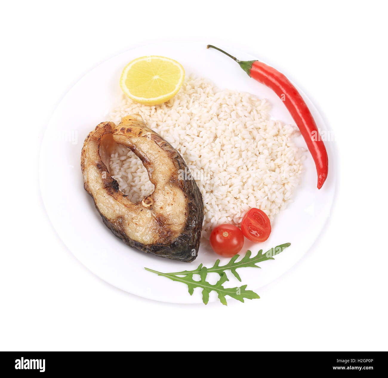 Grilled salmon steak with vegetables on plate Stock Photo - Alamy