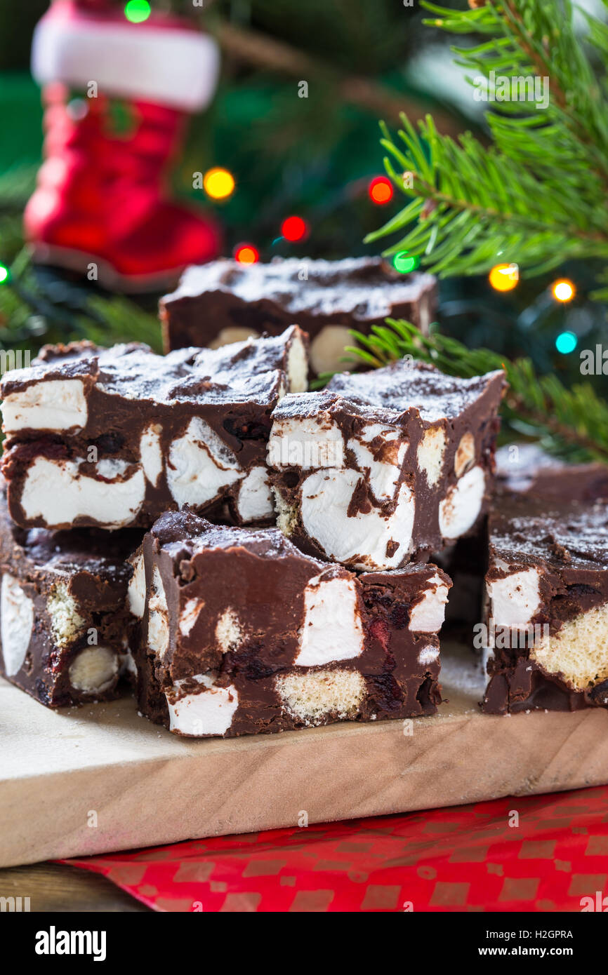 Rocky road crunch bars, christmas dessert made with chocolate,  marshmallow, hazelnut, biscuit and glace cherries Stock Photo