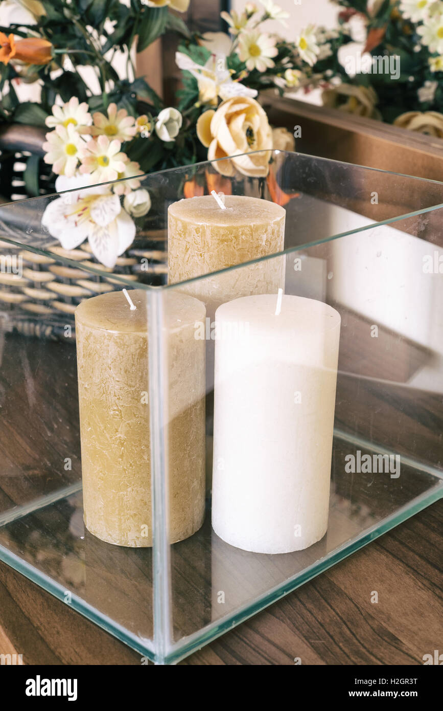 tray decorated with candles on a sideboard. toned image Stock Photo